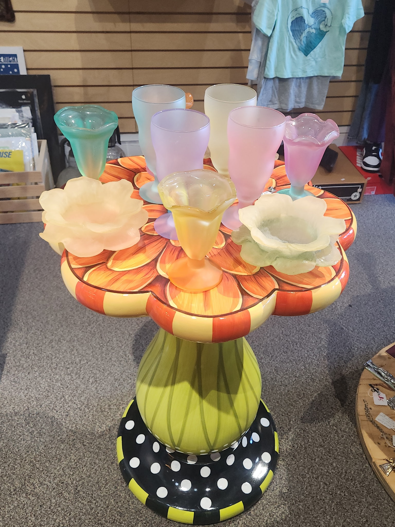 Red glassware shelf display
